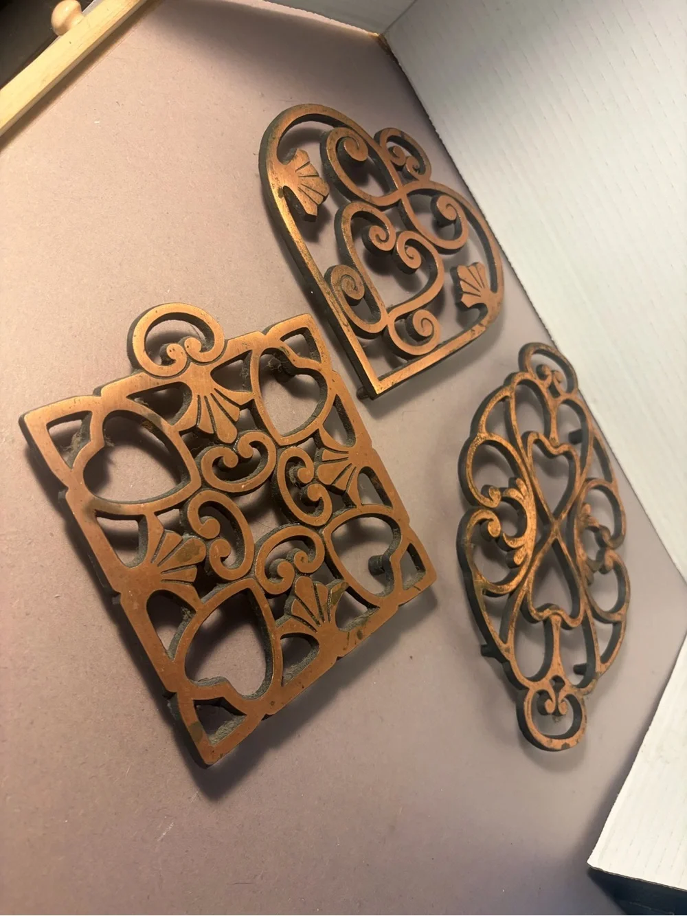 Pampered Chef Copper-Tone Decorative Cast Iron Trivets Set